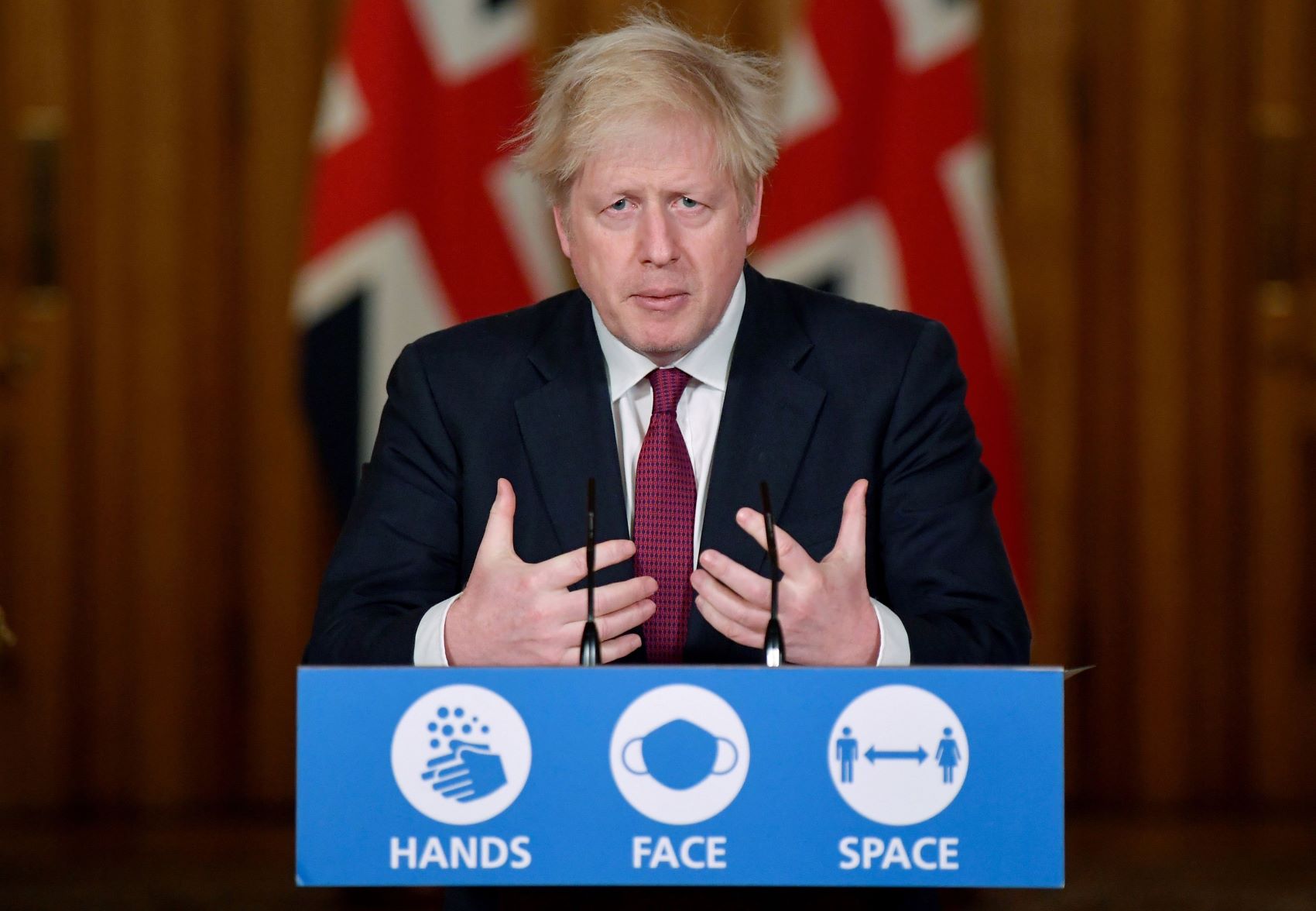 ジョンソン英首相は緊急記者会で、新たに見つかった新型コロナウイルスの変異種が従来種に比べて強い感染力を持っているとの分析結果を発表＝イギリス・ロンドン（2020年12月19日）【AFP時事】