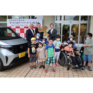 MKチャリティカップ寄付活動で日産軽EV「サクラ」を寄贈。子どもたちへの環境学習やV2H対応充電器で災害時の非常電源にも。